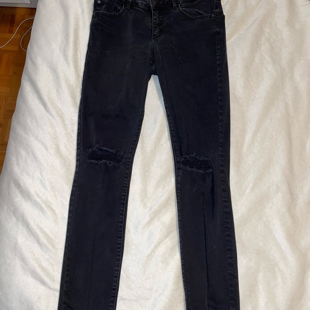 Garage ripped knee black skinny jeans